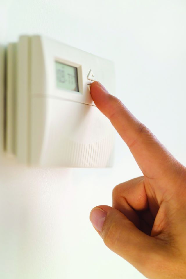 adjusting a thermostat