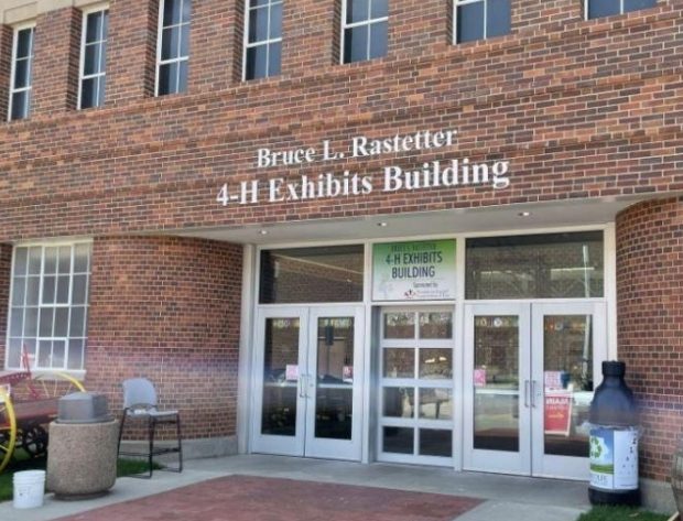 Exterior Image of the Bruce Rastetter 4-H Exhibits Building with Touchstone Energy signage on windows