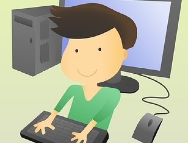 boy playing on computer