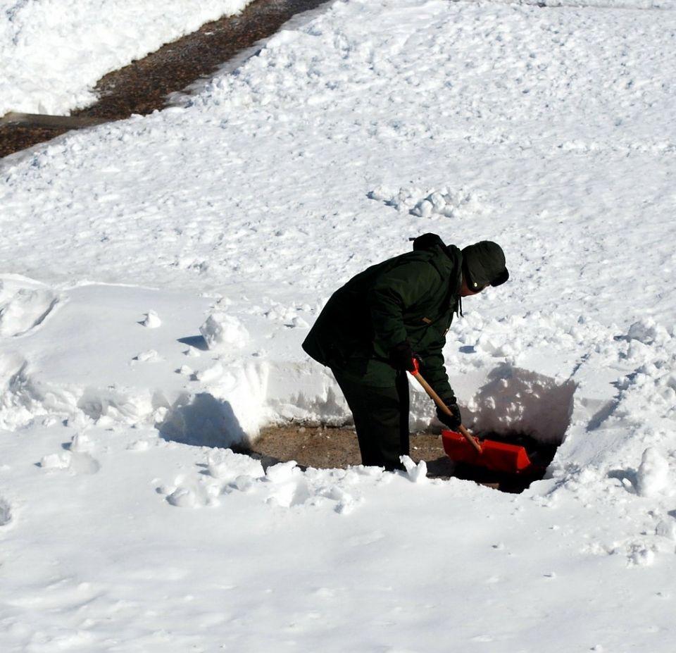 man shoveling snow