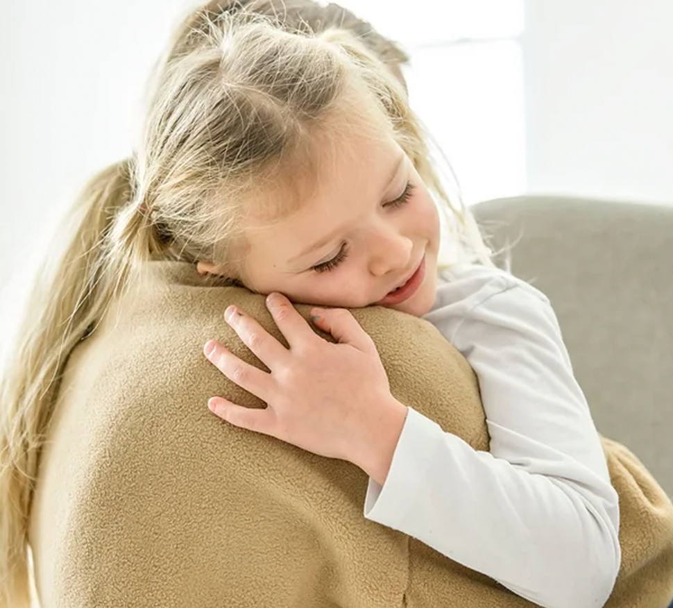 Mom and child embracing