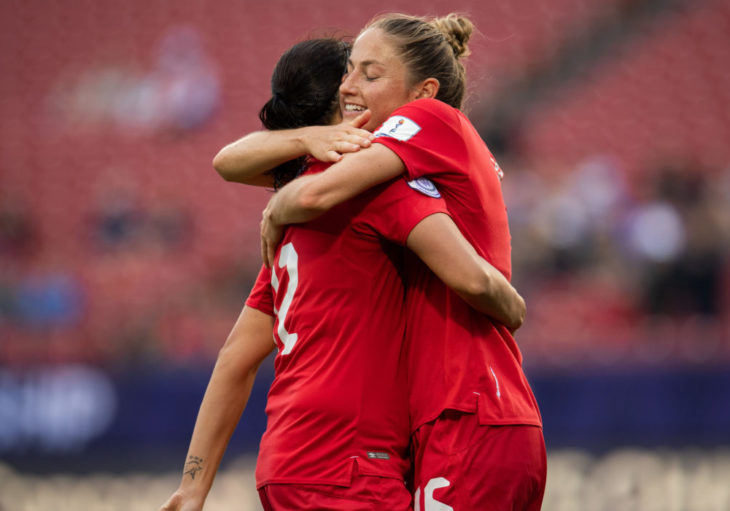 Janine Beckie celebrates a goal with Christine Sinclair. Canada Soccer)