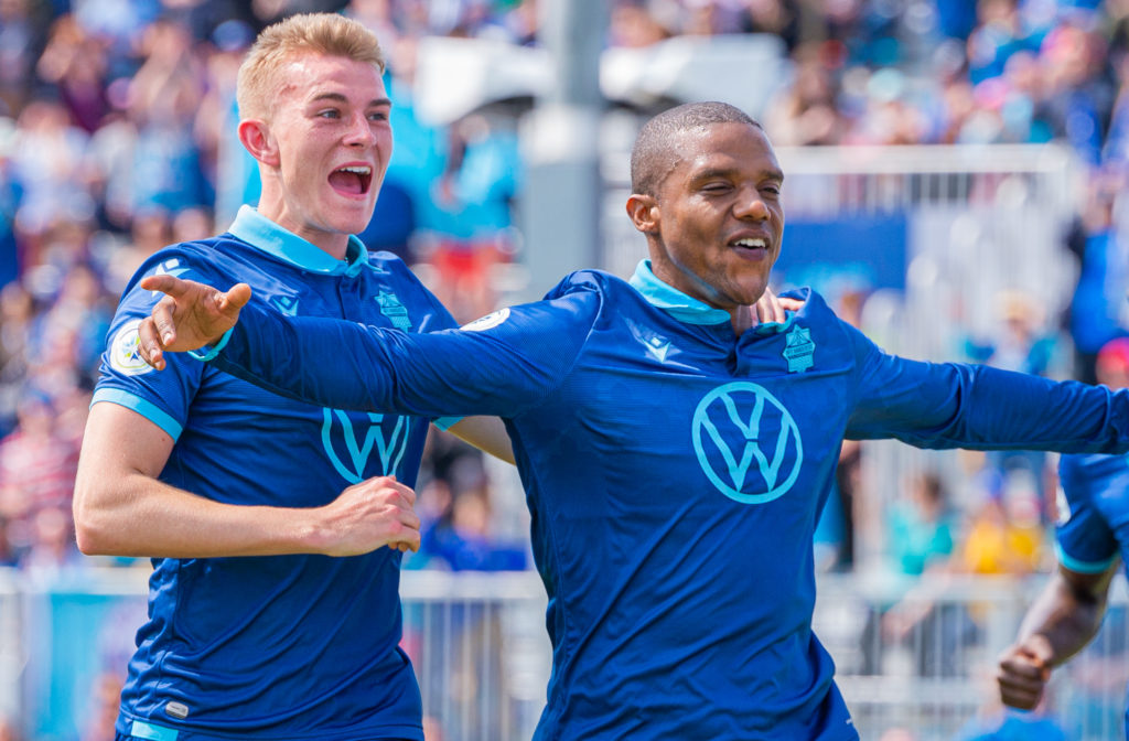 HFX striker Luis Alberto Pera (R) celebrates his game-winning goal over Pacific FC. (Photo: Trevor MacMillan/CPL).