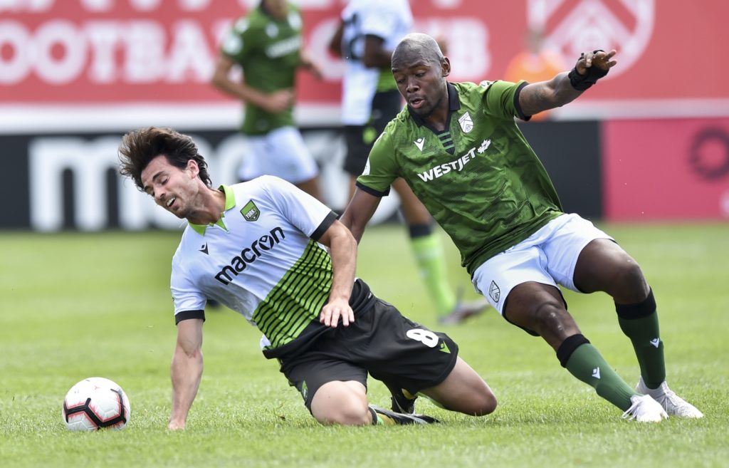 Joseph Di Chiara of York9 FC and Jordan Brown of Cavalry FC vie for the ball. Mike Sturk/CPL
