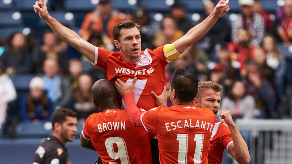 Cavalry captain Nik Ledgerwood celebrates a goal over Valour in an 8-0 win. (Photo: David Lipnowski/CPL).