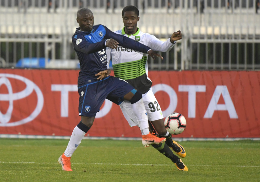 Jun 5, 2019; York, Ontario, CAN; FC Edmonton midfielder Randy Edwini-Bonsu (11) battles for the ball with York 9 forward Michael Cox (92) in the second half of a Canadian Championship soccer match at York University Field. Mandatory Credit: Dan Hamilton-USA TODAY Sports for CPL