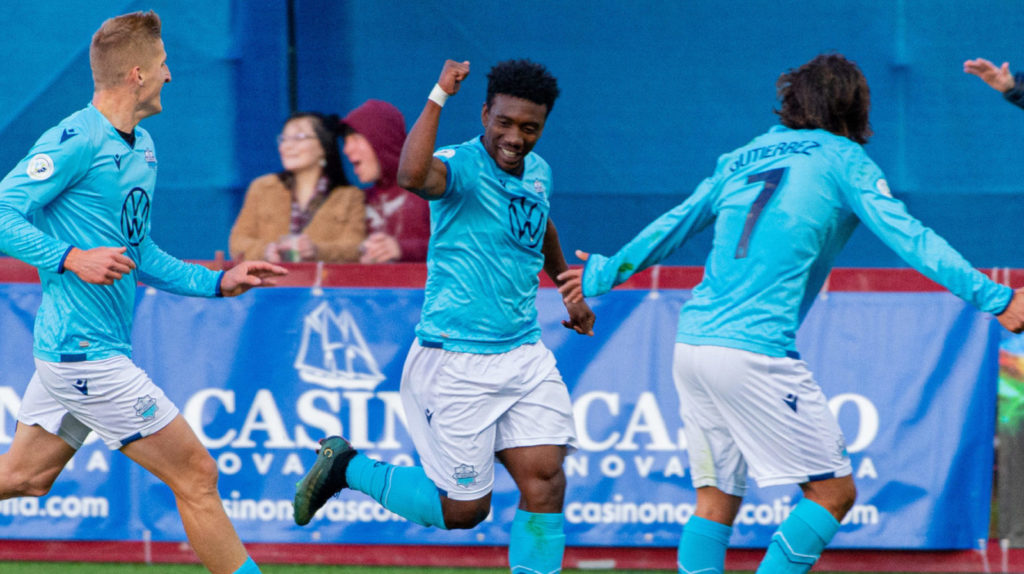 HFX Wanderers FC Attacker Akeem Garcia (11) celebrates his first half goal with attacker Tomasz Skublak (17) and midfielder Juan Diego Gutierrez (7). (Trevor MacMillan/CPL)