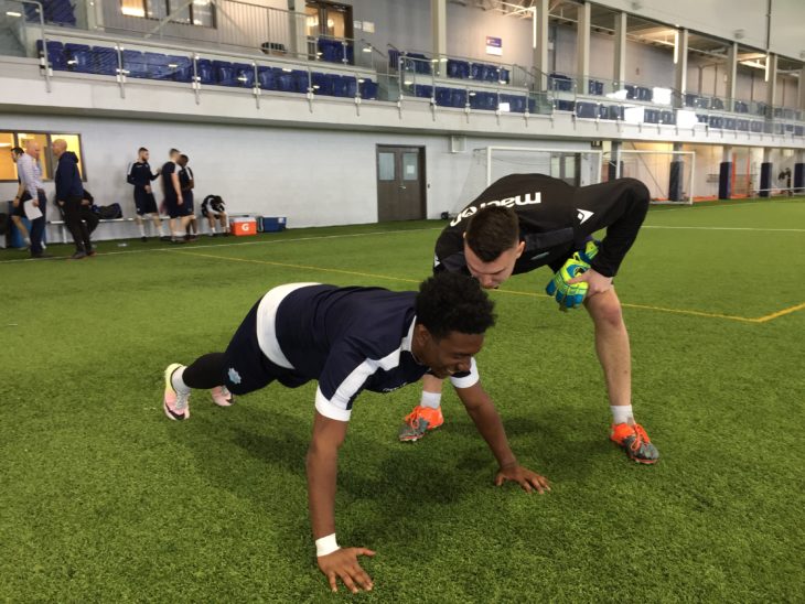 Christian Oxner enjoying winning this push-up challenge against Akeem Garcia.