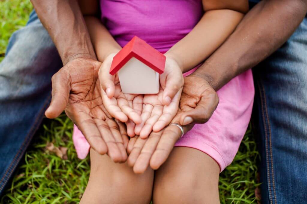 Hands of family together