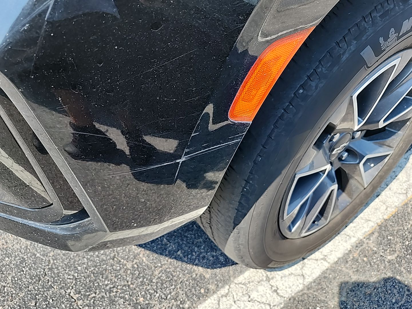 Dented Gradung Bucket L Qtr Panel (Mult Dents/Paint Dmg)
