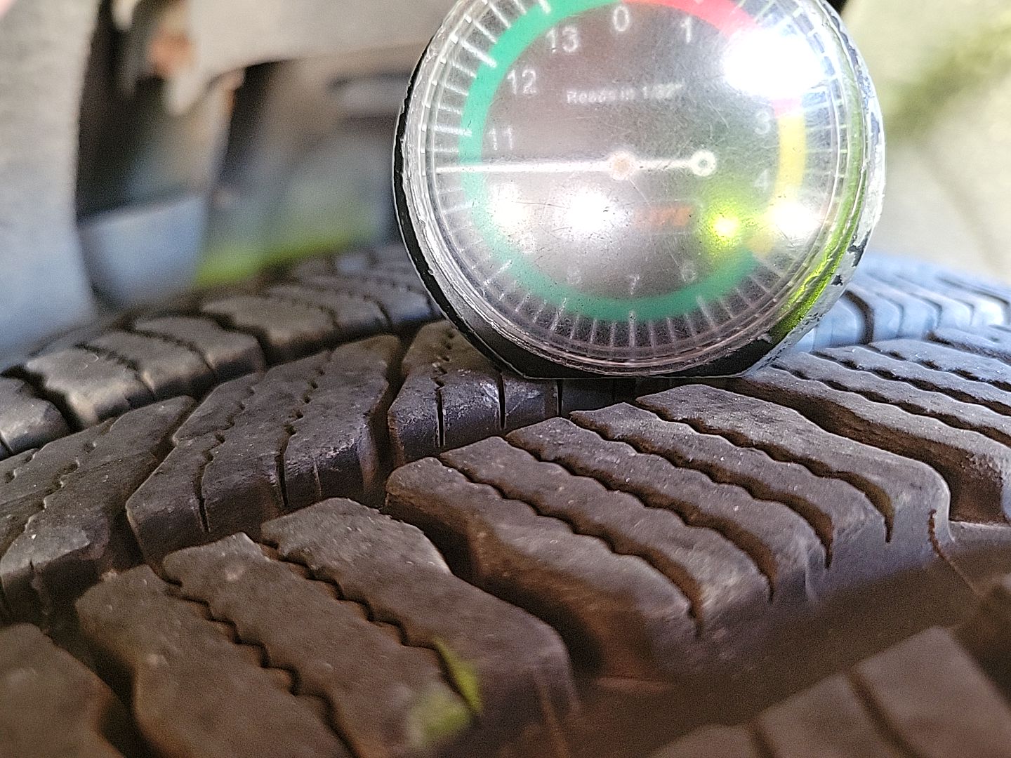 Dented Gradung Bucket LR Tire Tread