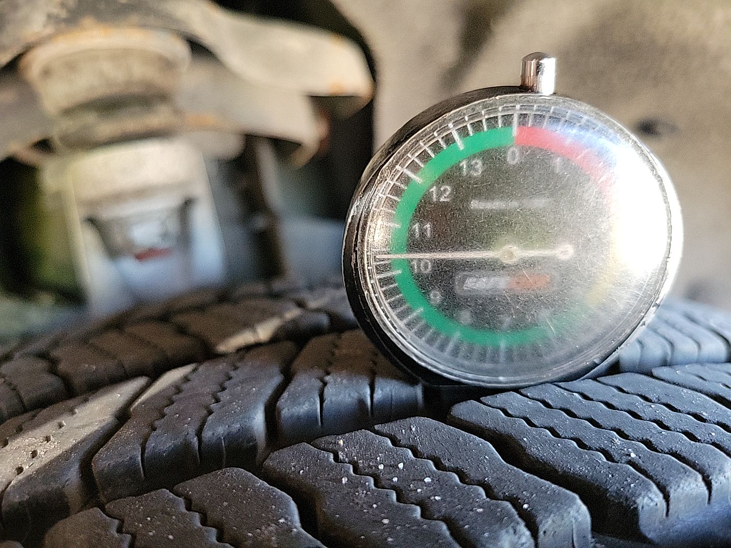 Dented Gradung Bucket RR Tire Tread
