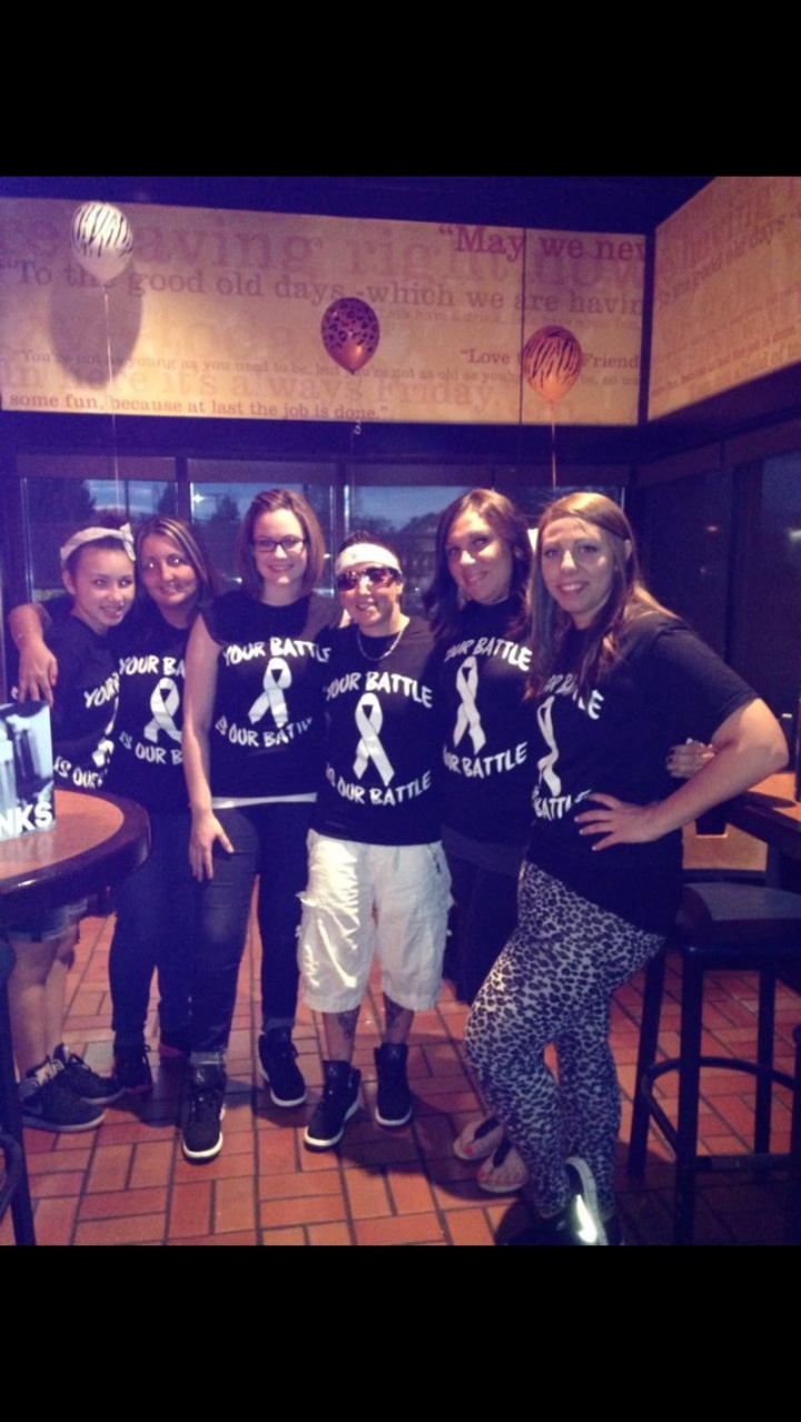 Your Battle Is Our Battle T-Shirt Photo