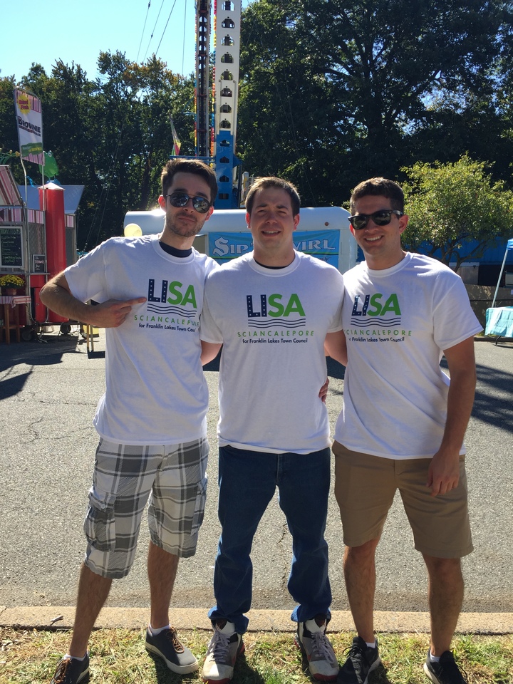 Volunteers At Town Fair  T-Shirt Photo