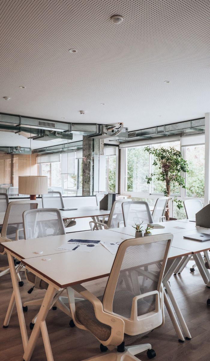 What is the primary duty of a janitor or custodian in a commercial building?