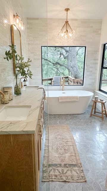 Dream bathroom essentials… 

Soaking tub 🛀 
Swoon-worthy tile 🤩
Mood lighting 💡 

Follow @thewimberleyway for more renovations and design inspo 
Floor & Wall Tile @bedrosianstile 

#masterbathroom #masterbathroomdesign #masterbathroomremodel #prim