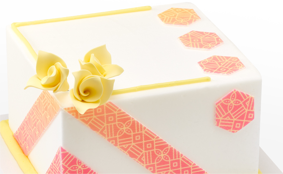 White Cake with Yellow Roses and Patterns