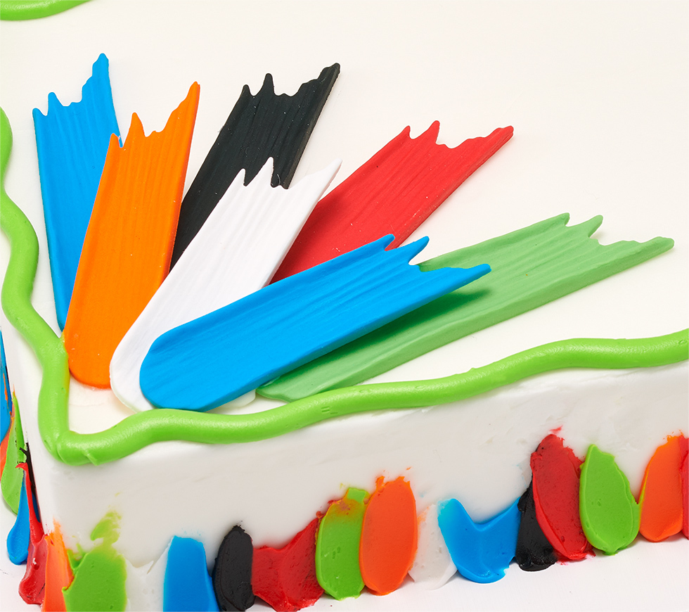 Sweet Décor Primary Brushstroke on Corner of Cake Closeup