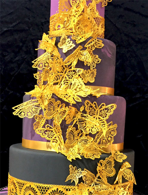 Cake Decorator Spotlight Metallic Gold Tiered Cake