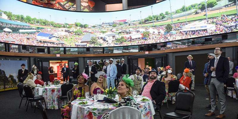 guests in the great hall watching the 360 screen
