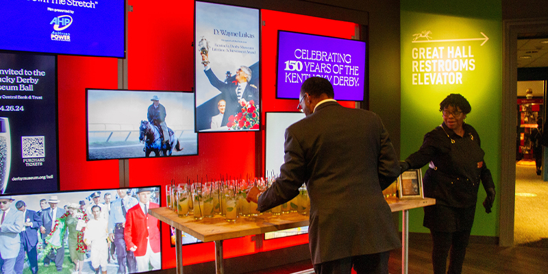 the great hall mosaic wall with drinks for guests