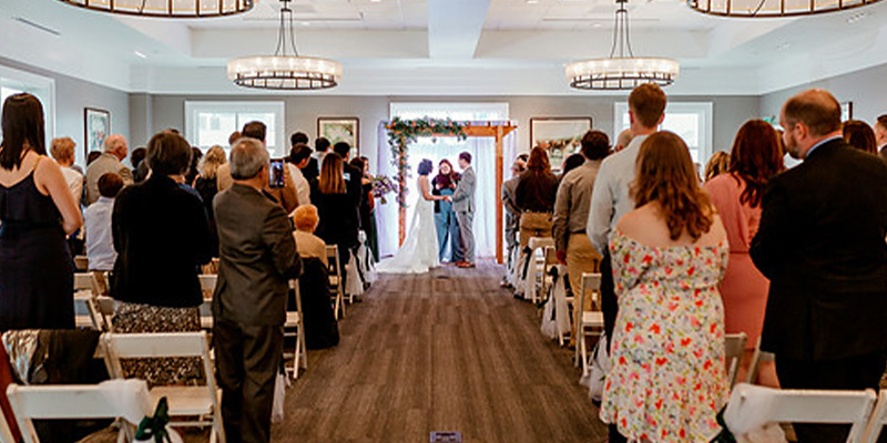 couple being wed at the 2nd floor gallery