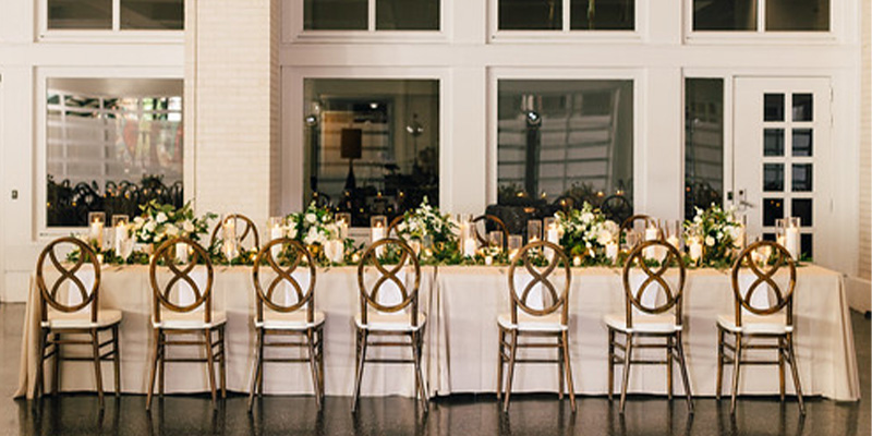 oaks terrace reception table set up near windows