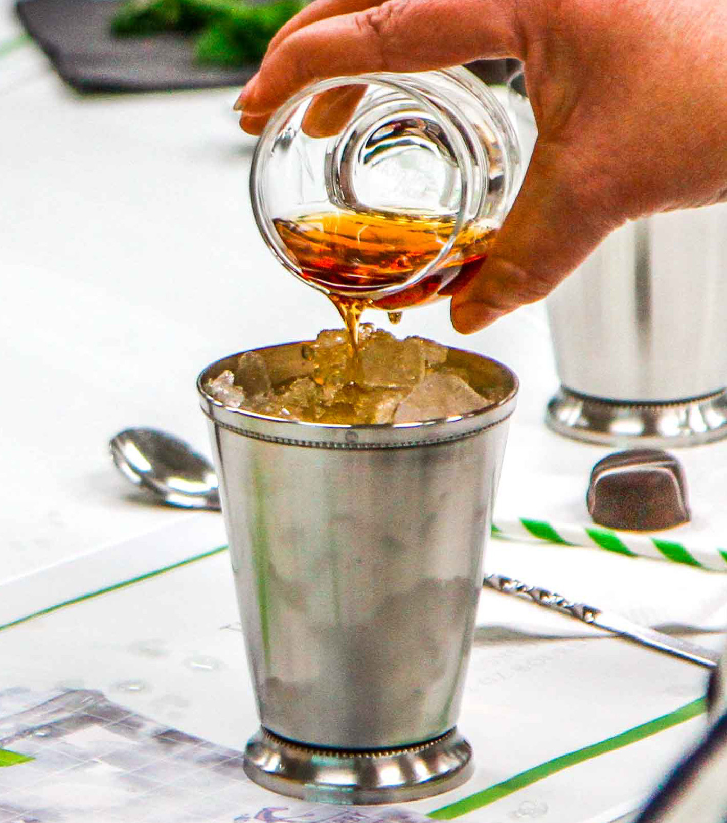 person making a mint julep