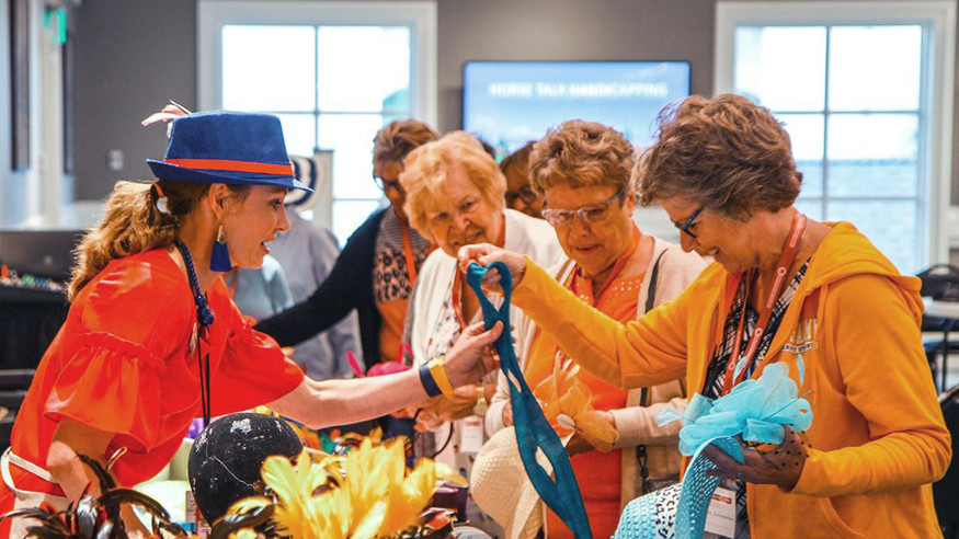 group of women crafting hats
