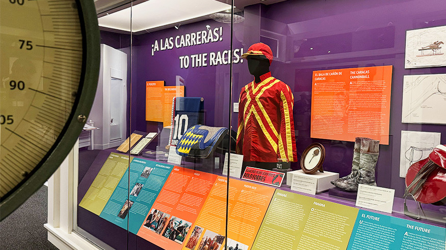 A Las Carreras! exhibit photo of artifacts on display