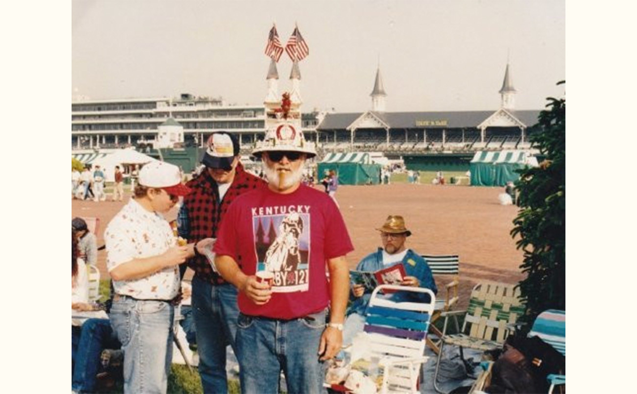 man in a red t-shirt at the 121st kentucky derby