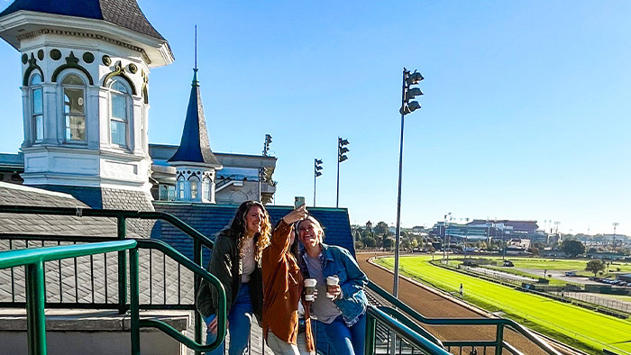 Guests up close to the Twin Spires taking a selfie.