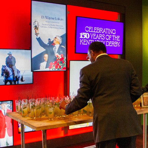 the great hall mosaic wall with drinks for guests