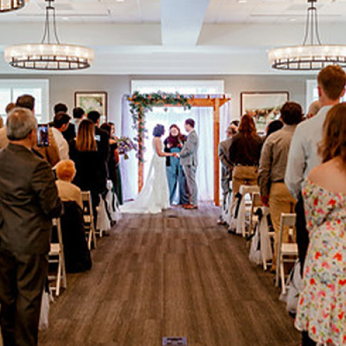 couple being wed at the 2nd floor gallery