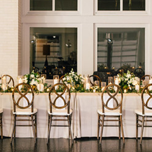 oaks terrace reception table set up near windows