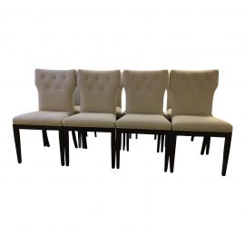 Set of Eight Tufted Linen Dining Chairs. Original Price: $12,200.00