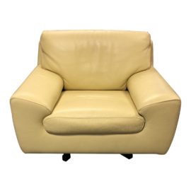 Roche Bobois Leather Swivel Armchair. Original Price: $5,000
