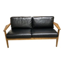 West Elm Mathias Mid-Century Wood Frame Leather Loveseat. Original Price: $2,500