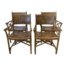 Late 20th Century McGuire Style Woven Leather + Bamboo Arm Chairs, a Set of Four