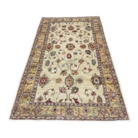 Pakistani Wool Area Rug - 4′8″ × 8′. Original Price: $2,400