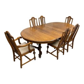 Mid 20th Century Oak Rift Cut Round Extension Dining Set