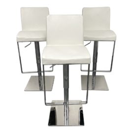 Saffron White Adjustable Stools - Set of Three. Original Price: $1,800