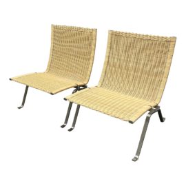 Poul Kjaerholm Style Caned Lounge Chairs, a Pair. Original Price: $1,800