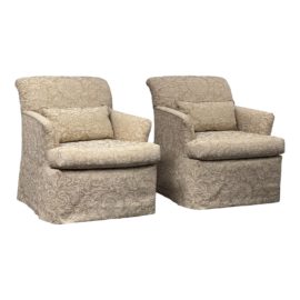 A. Rudin + Kroll Champagne Swivel Lounge Chairs, a Pair. Original Price: $5,000