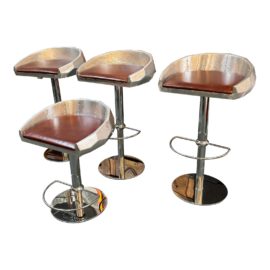 Modern Faceted Aluminum Adjustable Stools, Set of Four. Original Price: $2,000