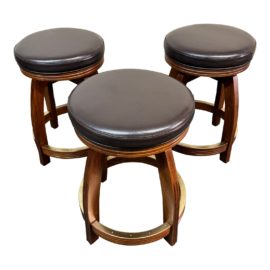 J S Products Swivel Leather Counter Stools, Set of Three. Original Price: $1,272
