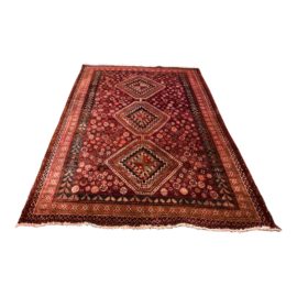 Vintage Shiraz Handwoven Wool Area Rug - 6′10″ × 9′10″. Original Price: $3,500