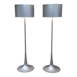Flos Spun Light F Floor Lamps, a Pair. Original Price: $5,250