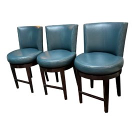 A. Rudin No. 680 Teal Leather Swivel Countertop Stools, Set of Three. Original Price: $7,500