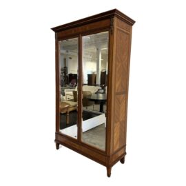 Late 19th Century French Walnut Louis XV Armoire With Mirrored Cabinet Pocket Doors. Original Price: $14,000